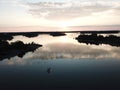 like a mirror is the sunset in archipelago by drones poin of view the gulf of Finland