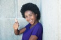 Awesome african american woman showing thumb up