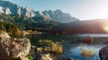 Awesome alpine highlands in sunny day. Nature Landscape. The Eibsee Lake in front of the Zugspitze under sunlight reflected in