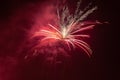 Awesome effects of red and white fireworks against the backdrop of the night sky Royalty Free Stock Photo