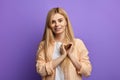 Awesome girl in striped shirt and white T-shirt showing heart with two hands Royalty Free Stock Photo