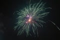 Awesome green and orange fireworks against the backdrop of the night sky Royalty Free Stock Photo