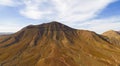 Awesome high level aspect panoramic view of the dramatic volcanic mountains on the island of Fuerteventura