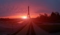 Awesome incredible pink-orange-lilac sunrise. View of the Eiffel
