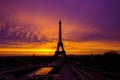 Awesome incredible pink-orange-lilac sunrise. View of the Eiffel