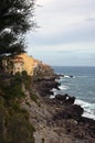 Awesome landscape of colorful houses on the cliffs. Waves are crashing the rocks, Tyrrhenian sea in autumn season