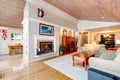 Awesome living room interior with sloped wooden ceiling.