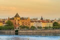 Awesome looking buildings and standout landmark buildings along a tributary of the Vltava River under the sunset