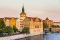 Awesome looking buildings and standout landmark building of old town water tower along a tributary of the Vltava River under the