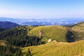 Awesome mountain landscape, nature and its beauty, located on the Red Mountain, Romania. Shepherd and flock of sheep