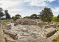 Awesome panoramic view in the Roman empire excavation ruins at Ostia Antica with the beautiful mosaic of Cisiarii thermal spa and Royalty Free Stock Photo