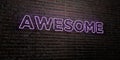 AWESOME -Realistic Neon Sign on Brick Wall background - 3D rendered royalty free stock image