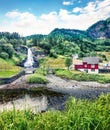 Awesome summer scene of waterfall Steinsdalsfossen on the Fosselva River. Picturesque evenig scene of  village of Steine, Royalty Free Stock Photo
