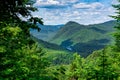Awesome summer view from a verdant hill in Jacques Cartier National Park, Quebec province, Canada