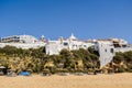 Awesome view of Albufeira whitewashed houses on cliff, Praia dos Pescadores, Albufeira, Portugal