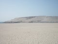 Awesome view of sand dune near the sea in dubai uae Royalty Free Stock Photo