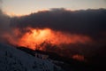 Awesome winter landscape with bright colorful sky at sunset.