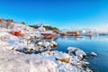 Awesome winter scenery of Moskenes village with ferryport and famous Moskenes parish Churc