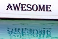 Awesome written on the side of a boat in Spain