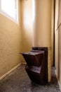 Old garbage chute in apartment building with cheap apartments - Rubbish chute in a Soviet block of flats Royalty Free Stock Photo