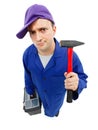 Awkward repairman with hammer Royalty Free Stock Photo