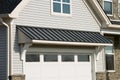 awning over garage door front home beautiful shade Royalty Free Stock Photo