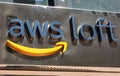 AWS Loft sign on the facade of Amazon office for AWS customers, startups and developers interested in learning more about AWS