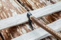 Ax among the boards on a wooden background start construction