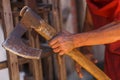 The ax in the hand of the medieval executioner Royalty Free Stock Photo