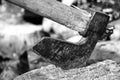 Ax, hatchet, axe. split a log with an ax. birch firewood in the background. wood wallpaper Royalty Free Stock Photo