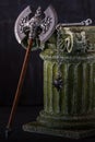 Double axe and flail over column Royalty Free Stock Photo