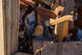 Axe stuck in a log in the yard about a woodpile on the street Royalty Free Stock Photo