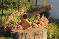 An axe is stuck into a stump to chop wood Royalty Free Stock Photo