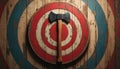 Axe throwing competition target with axe in center bullseye. Wood material with red blue white rings. Rustic timber background. Royalty Free Stock Photo