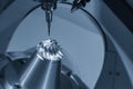 The  5-axis CNC milling machine  cutting the hi-precision automotive  by solid ball endmill tools. Royalty Free Stock Photo