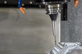 The 5-axis machining center cutting the V8 engine cylinder block with solid ball end mill tool