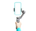 3-axis phone gimbal stabilizer in woman`s hand isolated on white background