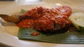 Ayam Goreng Balado is Indonesian favorite with fried chicken and spicy balado paste. Originating from West Sumatra, this dish