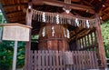 Ayasugi Myojin, the small shrine over the sacred tree. Shikichi-jinja Shrine. Kyoto. Japan