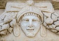 Aydin, Turkey - October 9, 2015: Portrait sculpture detail on a Greek ruin in Aphrodisias, Turkey.