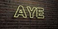 AYE -Realistic Neon Sign on Brick Wall background - 3D rendered royalty free stock image