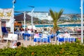 AYIA NAPA, CYPRUS - APRIL 21, 2017: People at outdoor restaurant in front of the sea