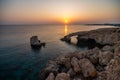 Ayia Napa, Cyprus landscape with beautiful love rock bridge on mediterranean sea at sunset Royalty Free Stock Photo
