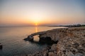 Ayia Napa, Cyprus landscape with beautiful love rock bridge on mediterranean sea at sunset Royalty Free Stock Photo