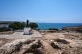 Man with binoculars observer sculpture at the view point next to Vathia Gonia beach, Cyprus Royalty Free Stock Photo