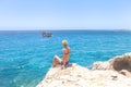 Ayia Napa, Greece - July 19, 2016: Summer fun, Friends cliff jumping into the ocean Royalty Free Stock Photo