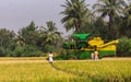 Pick thresher, in rice field, Ayodhya, Karnataka, India