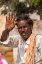 Waving young farmer, Ayodhya, Karnataka, India