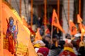 Zoomed shot showing crowd of people carrying flag celebrating the Pran Pratishtha consecration of Ram mandir temple