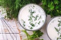 Ayran with fresh herbs. Traditional Turkish yoghurt drink.